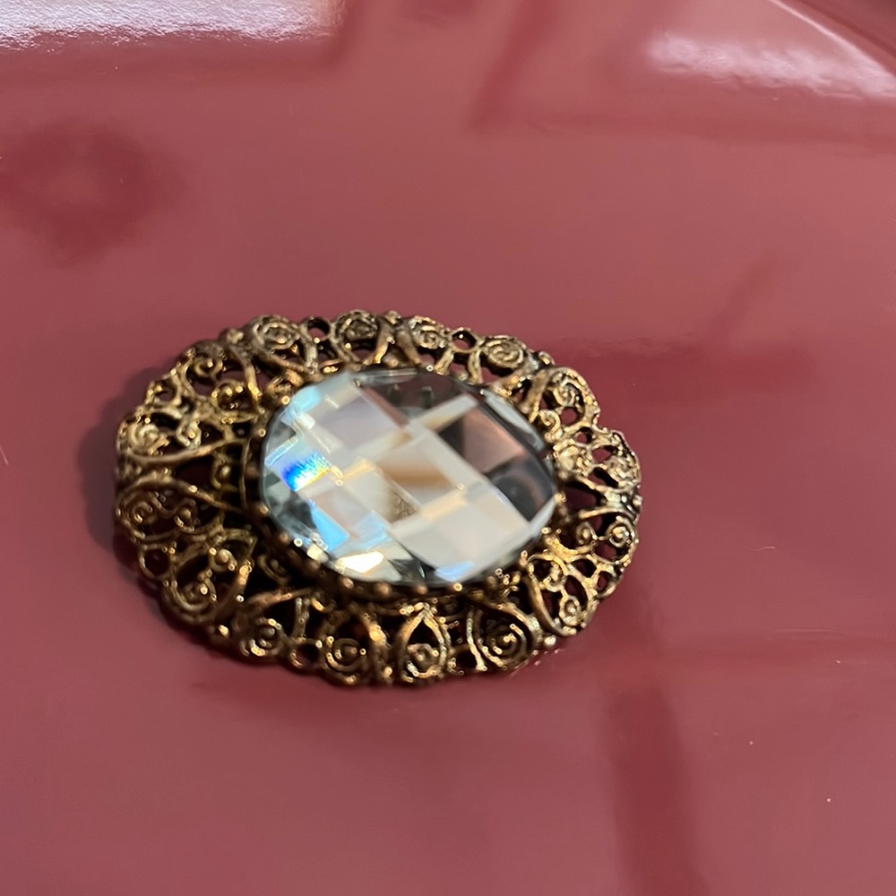 Blue stone brooch